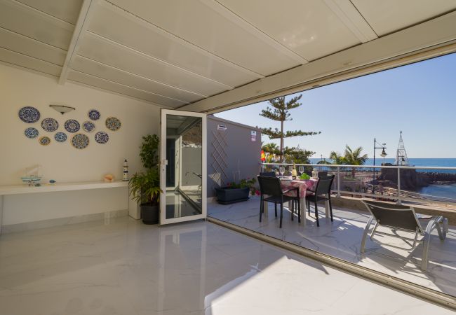 Living room open to terrace sea view playa mogán Living room open to terrace sea view playa mogán